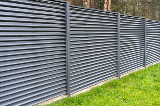 blank metal fence in the village.